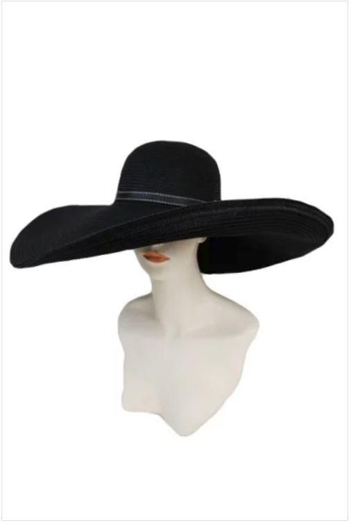 This nice sun hat is perfect for a nice sunny day and very trendy. Hat has extra brim with wire so it's very easy to fold in different styles and accented with a faux leather band around the brim. Brim Length: 7" inches NOTE* - Also available in Cream Ivory, Khaki, Natural and Tan Circumference: 23 1/2 inches Brim: 7 inches Material: 100% Toyo Straw Style of Hat: Floppy Sun Hat Cheap Fedora Sun Hat For Outdoor, Affordable Black Fedora With Flat Brim, Vintage Wide Brim Sun Hat, Cheap Adjustable Hat With Curved Brim, Luxury Curved Brim Fedora For Winter, Affordable Black Cotton Sun Hat, Luxury Wide Brim Cowboy Hat For The Beach, Cheap Trendy Wide Brim Sun Hat, Luxury Black Fedora With Curved Brim