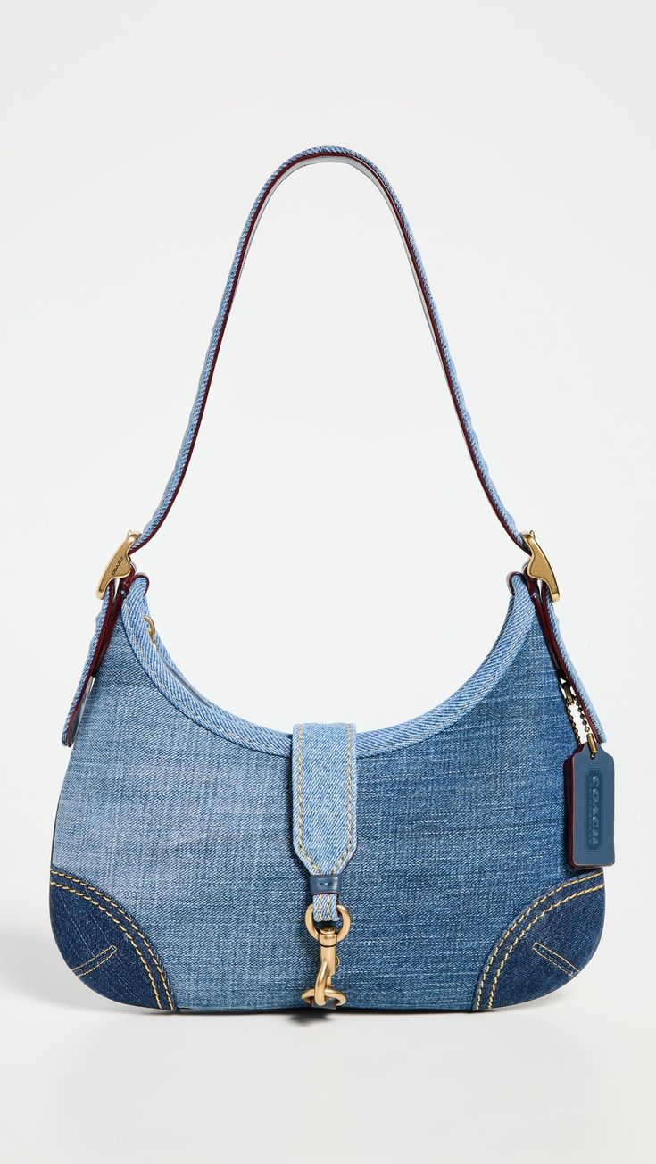 DenimLeather trim Contrast stitchingZip closurePatch interior pocketOptional, adjustable strapLining: TextileWeight: 10oz / 0.28kgImported, VietnamStyle #COADB30517 Coach Denim, Coach 1941, Denim Purse, Coach Shoulder Bag, Denim Bag, Lucky Girl, Coach Bag, Coach Purses, Contrast Stitching