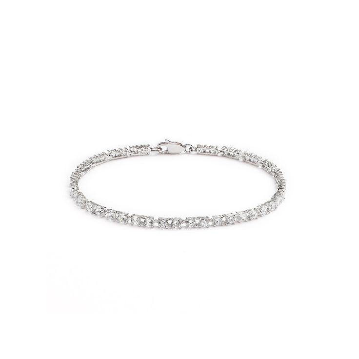 Add instant elegance to any ensemble when you wear this cubic zirconia bracelet. Click on this JEWELRY & WATCHES GUIDE to learn about fit, styles, materials and more!Bracelet Details: Length: 7.5-in. Clasp: box Metal: rhodium over silver-plated bronze Cubic Zirconia Details: Cut: round Color: white Setting: prong Size: One Size. Gender: female. Age Group: adult. Material: Silver Plate. Classic Bracelets With Sparkling Stones In Diamond White, Classic Diamond White Bracelets With Sparkling Stones, Classic Diamond White Bracelet With Sparkling Stones, Classic Round Crystal Bracelet In Diamond White, Classic Diamond Bracelet With Prong Setting In Crystal, Sparkling White Gold Bracelets With Cubic Zirconia, Classic White Cubic Zirconia Crystal Bracelet, Classic Crystal Bracelet With Sparkling Stones, Classic Sparkling Cubic Zirconia Bracelets