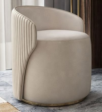 a white chair sitting on top of a marble floor