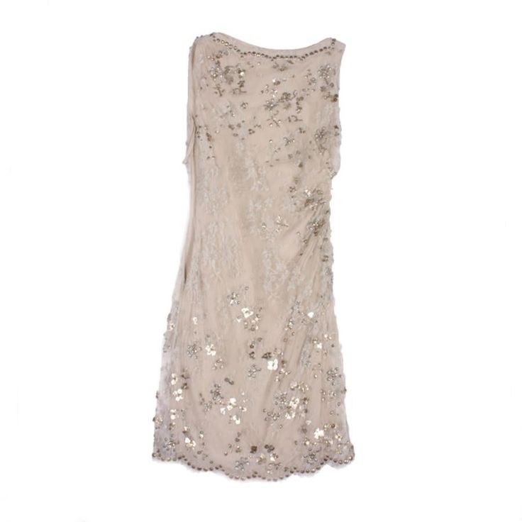 Elegant VALENTINO sleeveless cocktail dress in silver lace embroidered with metallic sequins lined (2 times) with beige silk chiffon, draped on the left side. It closes with a zipper on the right side. Size 36FR. Made in Italy. In very good condition. A small tear of 3 cm of the lace in the back (see photo) Dimensions flat: chest 38 cm. waist 33 cm. hips 39 cm, depth of the bottom 45 cm. Sleeveless Sequined Dress For Summer Wedding, Holiday Sleeveless Sequin Dress, Sleeveless Sequined Mini Dress For Weddings, Spring Wedding Sleeveless Sequin Dress, Sleeveless Lace Mini Dress For Party Season, Embellished Sleeveless Lace Dress, Embellished Sequin Lace Dress, Fitted Sleeveless Lace Dress With Sequins, Sleeveless Lace Sequin Dress For Summer