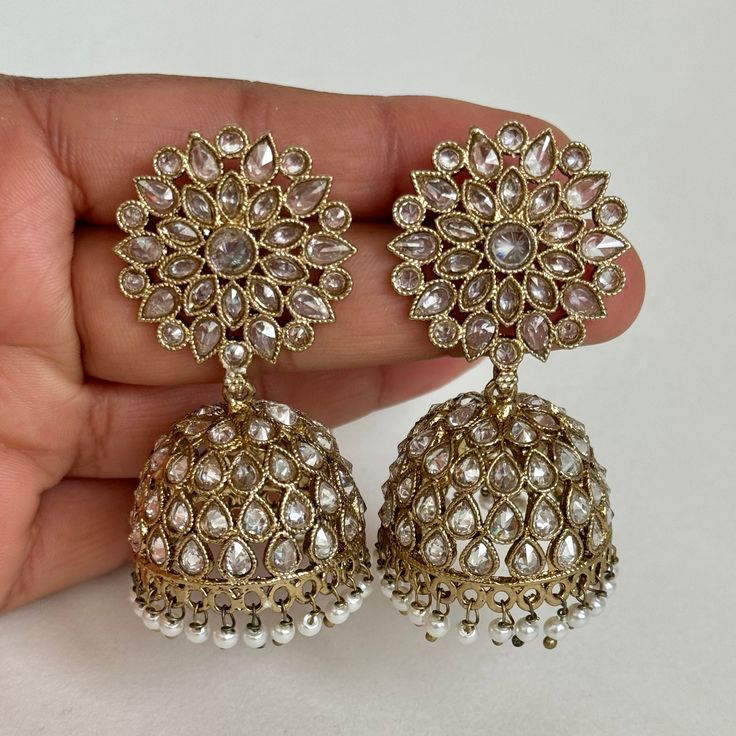 Antique Polki kundan Jhumka/stone Jhumka/Indian Jewelry/Pakistani Jewelry/Punjabi Jewelry/Statement earrings/Bridal earring/Indian wedding Length 2.25 inches Width 1 inche This is 100% Handmade jewelry. So Color, shades, texture displayed may slightly vary from the actual product due to digital image limitations. We request you to consider these minor variations. Please expect the possibility of some slight imperfections when buying hand made jewelry. If you have any questions, please message or Indian Bridesmaids Earrings, Luxury White Jhumkas With Latkans, Luxury Kundan Jhumkas With Gota Work, Luxury Kundan Jhumkas For Eid, Luxury Kundan Round Jhumkas, Luxury Hand Set Jhumkas For Wedding, Luxury Kundan Temple Jewelry Jhumkas, Luxury Festive Stone Work Jhumkas, Navratri Kundan Bridal Earrings With Intricate Design