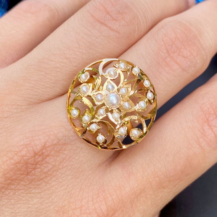 Featuring an elegant pearl ring made in 22ct gold and set with freshwater pearls The ring weighs 4.6 GMs *The same design custom made in gold plated sterling silver will cost ~ USD 95* Price Breakup Summary Component Rupees % of Total 22k Gold 23,232 76.6% Stones & Beads 1,056 3.5% Making Charges 4,182 13.8% Taxes (GST) 854 3.0% Total 30,324 100.0% View Detailed Price Breakup Watch Video Here Oval Pearl Ring In Yellow Gold With High Luster, Oval Yellow Gold Pearl Ring With High Luster, Gold Hallmarked Oval Pearl Ring, Oval Hallmarked Gold Pearl Ring, Fine Jewelry Yellow Gold Pearl Ring With High Luster, Gold Oval Hallmarked Pearl Ring, Yellow Gold Pearl Ring With High Luster, Antique Yellow Gold Pearl Ring With Rose Cut Diamonds, Victorian Yellow Gold Pearl Ring With Rose Cut Diamonds