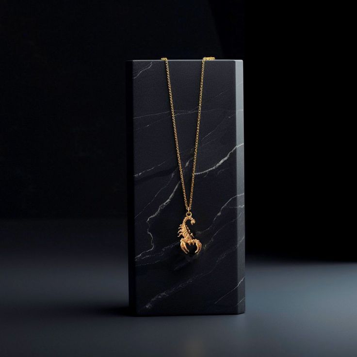 Discover our gold Scorpio pendant, a celestial masterpiece crafted in solid gold. PENDANT INFORMATION This pendant is made of real, solid gold.• Made in USA• Size: Mini• Material: 14k or 18k solid gold• Finish: polished• Height: 1.1" (28,5 mm) x Width: 0.75" (19,5 mm)• Pendant weight (approx.): 3 grams (14k)• Bail: fits up to 4 mm chains• A certificate of authenticity is included• Delivered in our elegant jewelry box, making it the perfect giftPlease note: Our Mini sized pendants are small and d Luxury Gold Plated Large Pendant Jewelry, Luxury 14k Gold Large Pendant Jewelry, Luxury 14k Gold Jewelry With Large Pendant, Luxury Gold Jewelry With Large Pendant, Luxury Round Pendant Keepsake Jewelry, Luxury Keepsake Round Pendant Jewelry, 14k Gold Pendant Necklace For Keepsake, Luxury Brass Pendant Jewelry, Yellow Gold Pendant Jewelry For Keepsake