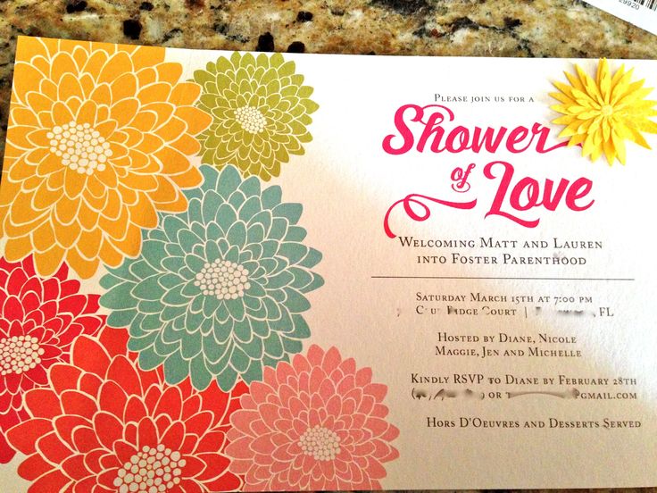 a wedding card with colorful flowers on it