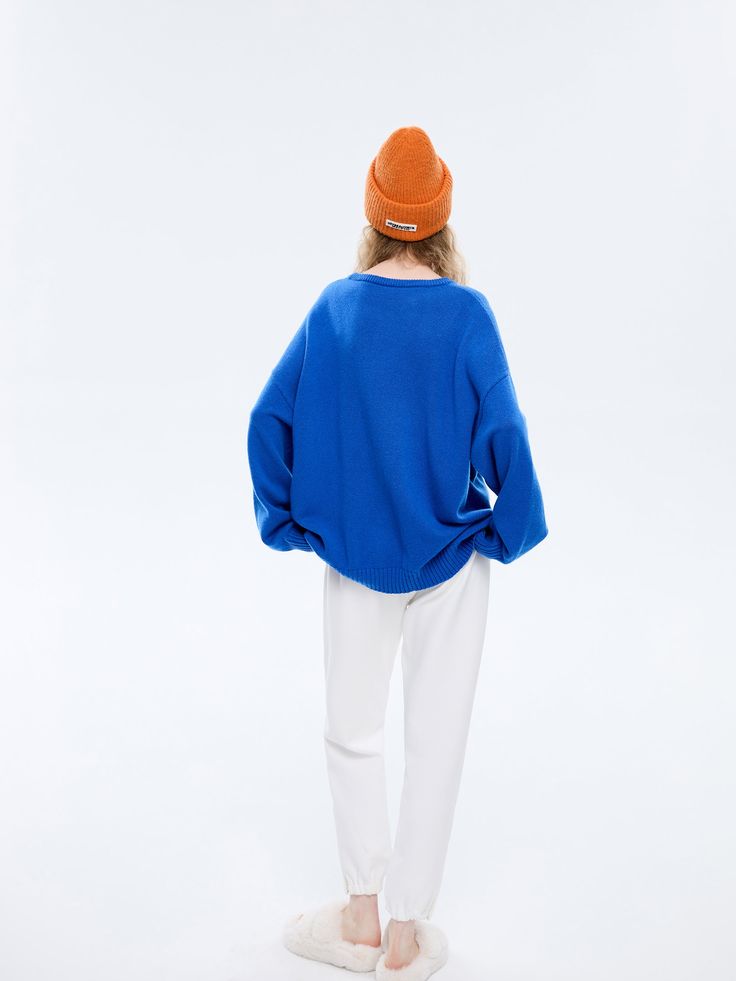 Details: Long sleeve wool-cashmere crewneck knit sweater in royal blue Dropped shoulder "Bunny clouds" knit throughout front Ribbed cuffs and detailing Oversized fit Materials & Care: 90% Wool, 10% Cashmere Dry clean only Do not bleach Size & Fit: Model is 5'7", Bust 32, Waist 24, Hips 35, wearing a size S Item #: LM1KT13 Blue Cashmere Sweater With Ribbed Cuffs, Blue Cashmere Sweater With Ribbed Collar, Blue Crew Neck Cashmere Sweater, Crew Neck Blue Cashmere Sweater, Blue Cashmere Top With Ribbed Cuffs, Casual Blue Merino Wool Sweater, Blue Cashmere Sweater For Spring, Winter Blue Fine Knit Cardigan, Blue Fine Knit Winter Cardigan