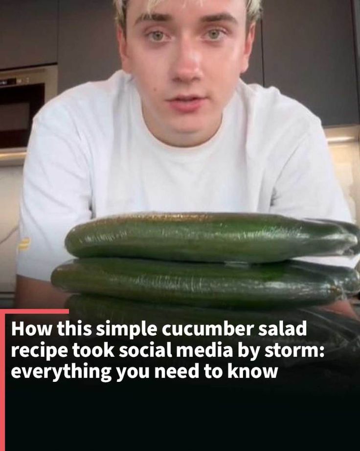 a man sitting at a table with some cucumbers on top of him and the caption reads, how this simple cucumber salad recipe took social media by storm everything you need to know