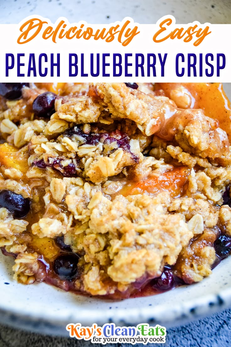 a bowl filled with blueberry crisp on top of a table