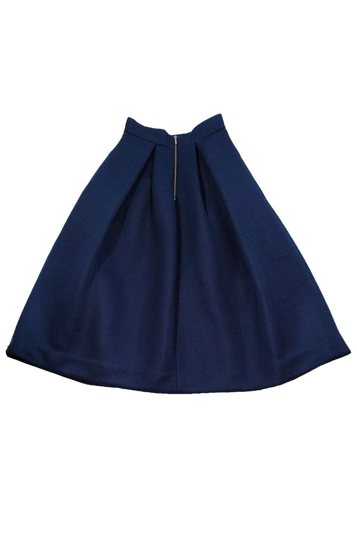 This lovely midi skirt has a full silhouette and it is designed in a mesh style fabric. Perfect for a casual dinner date with your friends, pair it with a fitted blouse and flats for a classic ensemble. Size 2 75% polyester, 25% viscose Exposed silver back zipper Mini skirt length interior lining Midi length Mesh-like fabric Waist 22" Total length 29.5" Chic Stretch Pleated Skirt For Party, Elegant Stretch Pleated Skirt For Night Out, Chic Stretch Knee-length Pleated Skirt, Fitted Navy Pleated Lined Skirt, Fitted Navy Pleated Skirt With Lining, Navy Fitted Lined Pleated Skirt, Blue Chic Full Pleated Skirt, Blue Midi Length Pleated Skirt For Workwear, Elegant Blue Midi-length Pleated Skirt