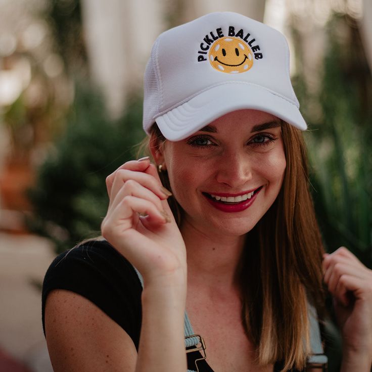 Check out this adorable Pickle Baller Trucker Hat! This foam trucker hat is sure to make you stand out on the court, and the snap adjustment means it will always fit just right. Plus, who can resist that cute pickle ball and smiley face design? 65% cotton, 35% polyester machine wash delicate or hand wash one size fits most adjustable back mesh netting snapback closure Are you looking for wholesale hats online? Look no further than Katydid Wholesale! We offer an extensive selection of wholesale h Boat Hair, Lake Hair Styles, Smiley Face Design, Funny One Liners, Pickle Ball, Wholesale Hair, Mesh Netting, Women Wholesale, Face Design