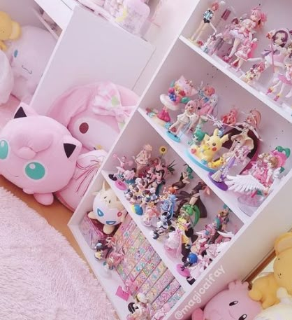 a room filled with lots of toys and stuffed animals on shelves next to a pink rug