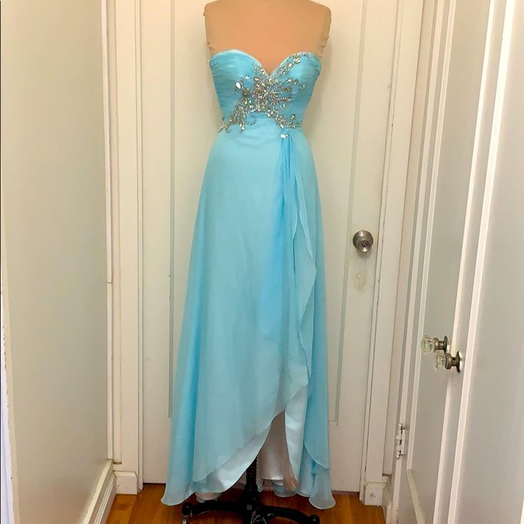 Strapless Mac Duggal Gown Nwt With Rear Zip (Goes All The Way Up, Just Too Small For Mannequin) And Hook And Eye Closure. Shorter In Front And Flowy Elegant Train In Back. Light Material And Good Weight To Lining. In Excellent Condition Never Worn. Light Blue Evening Dress With Sweetheart Neckline For Gala, Blue Strapless Gown For Gala, Blue Strapless Evening Dress For Formal Occasions, Blue Strapless Dress For Wedding And Prom, Blue Gown With Sweetheart Neckline For Formal Occasions, Blue Formal Gown With Sweetheart Neckline, Blue Sweetheart Neckline Gown For Formal Occasions, Formal Blue Strapless Evening Dress, Light Blue Formal Gown For Prom Season