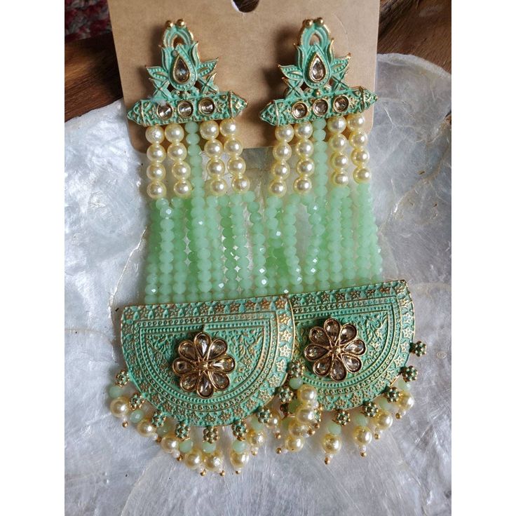 Beautiful Long Indian Style Earrings Beutiful Meenakari And Pearl Work Heavy Design But Light Weight Suitable For Any Dress And Occasions 4 1/5 Inches Long Have So Many Other Colors Pls Check My Listings For More Color Options Traditional Green Beaded Earrings For Party, Traditional Green Beaded Party Earrings, Traditional Dangling Beads Earrings For Celebration, Traditional Earrings With Dangling Beads For Celebration, Traditional Drop Beaded Earrings For Celebration, Traditional Beaded Drop Earrings For Celebration, Green Dangling Beads Earrings For Festivals, Festive Handmade Beaded Dangle Earrings, Bollywood Beaded Earrings For Festive Gift