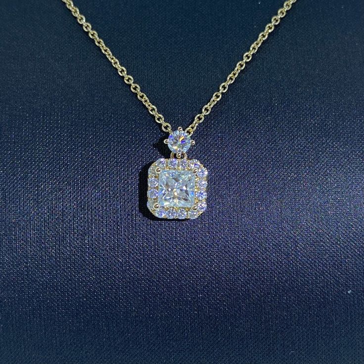 "The 0.60 ct Princess Cut Moissanite Mini Square Pendant is crafted from 14K Yellow Gold and 0.3ct/17ps shimmering white round moissanite to ensure sparkle from every angle. Suitable for everyday wear. Features: *Made to Order *Customer Gold Color: 14K Yellow Gold, 14K White Gold *Pincess Cut Moisssanite: 0.60 carats 1 piece *Gemstone: Round Cut Moissanite, 0.30 carats 17 pieces  *Metal Weight : 2.1 Grams *Necklace Length: 16\" + 2\" Extension   *Ready to ship in 1-2 weeks The necklace is 18\" in total length.  There is a 2\" segment that can reduce the necklace length to 16\".   All order comes with a beautiful jewelry box and gift bag. We accept 7 days no-hassle return policy.  Refer to Return & Exchanges policy for detail. If you have any question about this item, welcome to message us. Emerald Cut Moissanite Necklace With Prong Setting, Emerald Cut Moissanite Necklace For Anniversary, Emerald Cut Moissanite Necklace In Fine Jewelry Style, Emerald Cut Moissanite Necklaces Fine Jewelry, Emerald Cut Moissanite Fine Jewelry Necklace, Moissanite Necklace With Emerald Cut And Diamond Cut, Emerald Cut Diamond Necklace With Vvs Clarity For Anniversary, Emerald Cut Vvs Clarity Diamond Necklace For Anniversary, Emerald Cut Diamond Necklace With Prong Setting For Anniversary