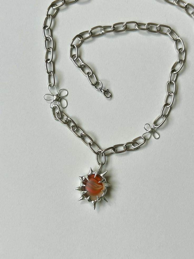 Unique and exclusive spiky necklace made with stained glass. One of a kind contemporary jewelry handcrafted from fused glass. Details: ♥ Each Piece Shown is ONE of a kind ♥ Soldered with Lead Free Solder �♥ Durable and Lightweight ♥ Delivered with a beautiful gift box Orange Chain Jewelry As Gift, Orange Chain Jewelry For A Gift, Unique Orange Glass Jewelry, Orange Metal Necklace For Gift, Silver Glass Flower Pendant Jewelry, Spiky Necklace, Soft Solder Jewelry, Chain Decorations, Soft Solder