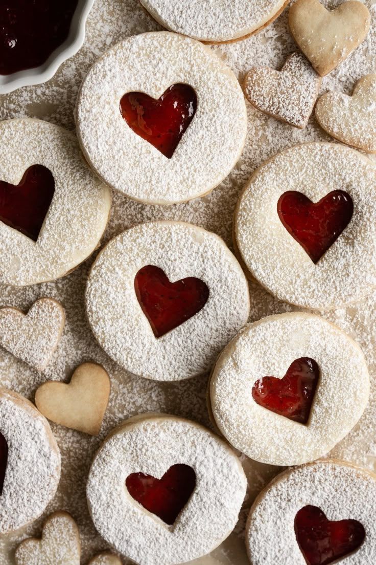 heart shaped cookies with jam in the middle