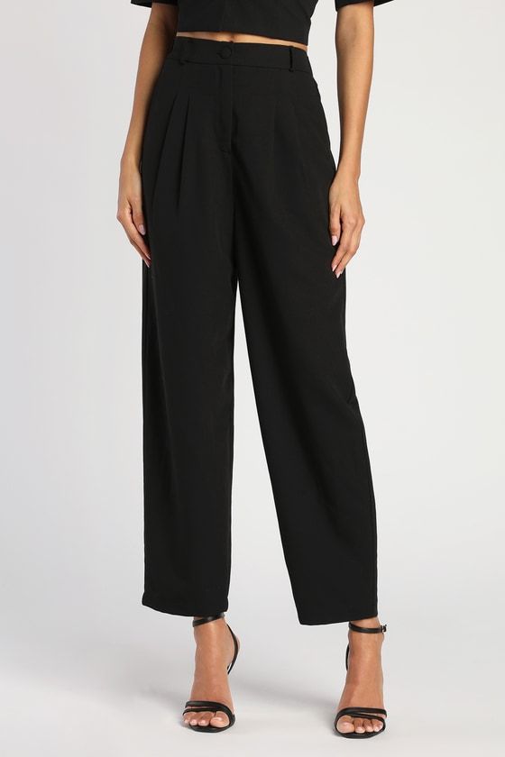 The Lulus Posh Company Black Pleated High-Waisted Trouser Pants will take your confidence levels to new heights! These dress pants are composed of woven fabric that shapes a pleated high-rise silhouette (with elastic at the back for fit), belt loops, a fabric-covered top button, and a hidden zip-fly. Relaxed, straight pant legs with side seam pockets end at ankle-length hems. Pair with the matching blazer for a complete look! Fit: This garment fits true to size. Length: Ankle length. Size medium Office High-waisted Pants With Elastic Waistband, Elegant High-waist Dress Pants With Elastic Waistband, Elegant High Waist Dress Pants With Elastic Waistband, Straight Leg Evening Pants With Belt Loops, Evening Bottoms With Belt Loops And Straight Leg, Elegant High Waist Wide Leg Pants With Elastic Waistband, Elegant High-waist Wide Leg Pants With Elastic Waistband, Straight Leg Pants With Belt Loops For Evening, Evening Straight Pants With Belt Loops