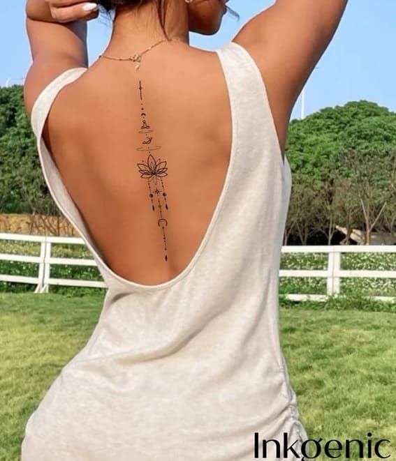 a woman with a tattoo on her back