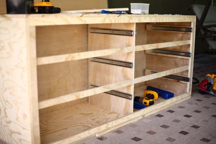 a workbench is being built with plywood