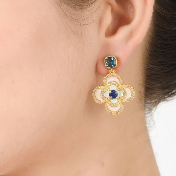 Diamond, Sapphire & London Topaz Gold Vermeil Over Sterling Silver Enameled Earring 925 Silver = 8.90 gm. Diamond, Sapphire & London Topaz = 3.60 ct. The beautiful earring measures to be 1.25 inches long and 1 inches wide. If for any reason you are not completely satisfied, you may return, exchange, replace, or credit your purchase within 15 days from delivery. Wholesale Enquiries? Contact us & we will get in touch with you! Elegant Gemstone Earrings With Enamel, Elegant Enamel Earrings With Gemstones, Luxury Enamel Earrings For Gift, Luxury Enamel Earrings For Anniversary, Luxury Hallmarked Enamel Earrings, Topas Gold, London Topaz, Enamel Earrings, Art Deco Diamond