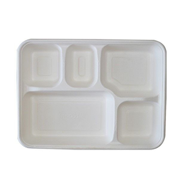 an empty plastic tray with four compartments