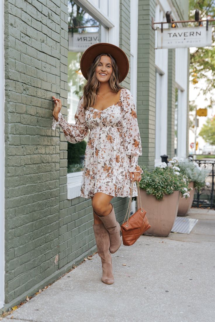 Let this dress be the standout piece in your fall wardrobe! This Cream Floral Mini Dress features a delicate sweetheart neckline, flattering elastic waist, and sheer sleeves, all in a flirty mini length. Perfect for any occasion, this dress offers a chic and feminine look for any fashion-forward individual. Style with knee high boots, a simple clutch, and a wide brim hat for a boho chic look. Dresses With Boots, Sorority Rush Outfits, Cream Floral Dress, Rush Outfits, Gameday Dress, Floral Print Mini Dress, Loungewear Dresses, Country Dresses, Fall Dress Outfit