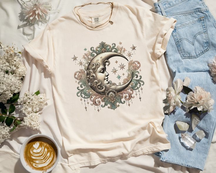 ✨ Flaunt your unique style with our aesthetic tees! This selfie-worthy design is printed with eco-friendly inks on the bestselling 100% cotton Comfort Colors t-shirt, an oversized top that feels like a well-worn favorite the moment you put it on. ✨ SIZING * Please refer to the size chart in the listing photos for exact measurements. * Better yet, simply lay out your favorite t-shirt and measure it, comparing it to our size chart. * This is a relaxed fit unisex sized shirt, which means that those Light Academia Cottagecore, Celestial Vintage, Aesthetic Tees, Cottagecore Shirt, Aesthetic Shirt, Moon Shirt, Aesthetic Shirts, Light Academia, Oversized Top