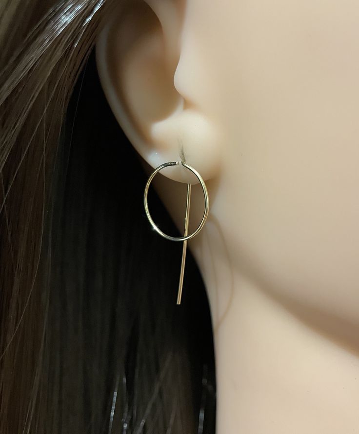 Open Circle Threader Earrings Available in 3 sizes:  Small - 1/2 inch circle  Medium - 3/4 inch circle  Large - 1 inch circle  .925 Sterling Silver, Argentium Silver, 14K Gold Filled and 14K Rose Gold Filled. Perfect for everyday wear, they stand out and are light on the ears.  We hope you love them as much as we do. All pieces are handcrafted in precious metals of 14K Gold, Gold Filled and Rose Gold Filled, .999 Fine Silver, .925 Sterling Silver and Argentium Silver.  Since all of our items are handmade and due to the nature of the creative process please allow for slight variations. Care instructions, polishing cloth and anti tarnish tabs are included with each piece of jewelry. Caring for your jewelry with gentleness is essential to the life and appearance of your jewelry. Our jewelry c Nickel Free Minimalist Round Jewelry, Minimalist Hypoallergenic Round Jewelry, Modern Hypoallergenic Jewelry, Modern Hypoallergenic Round Jewelry, Modern Round Hypoallergenic Jewelry, Dainty Linear Round Earrings For Everyday, Dainty Yellow Gold Round Linear Earrings, Gold Round Threader Earrings For Everyday, Yellow Gold Circle Earrings