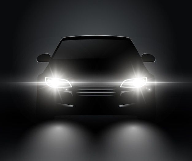 a car is shown in the dark with its headlights turned on and it's headlight