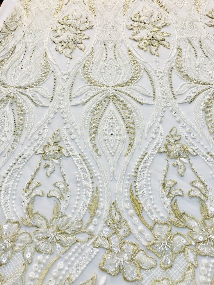 Ivory with gold highlights lace fabric. New! Collection 2019, lace fabric for bridaldress or evevning gown. Create a gorgeous beaded fabric wedding dress, just beautiful quality Sold by the yard Elegant Embroidered Fabric For Mother Of The Bride, Elegant Embroidered Lace Fabric For Ceremony, Elegant Lace With Intricate Embroidery For Ceremony, Elegant Embellished Fabric For Mother Of The Bride, Elegant Embellished Embroidered Fabric For Mother Of The Bride, Elegant Embroidered Lace Fabric For Receptions, Elegant Embroidered Fabric With Lace Work For Receptions, Elegant Gold Embroidered Fabric For Ceremonies, Elegant Embroidered Lace Work Fabric For Reception