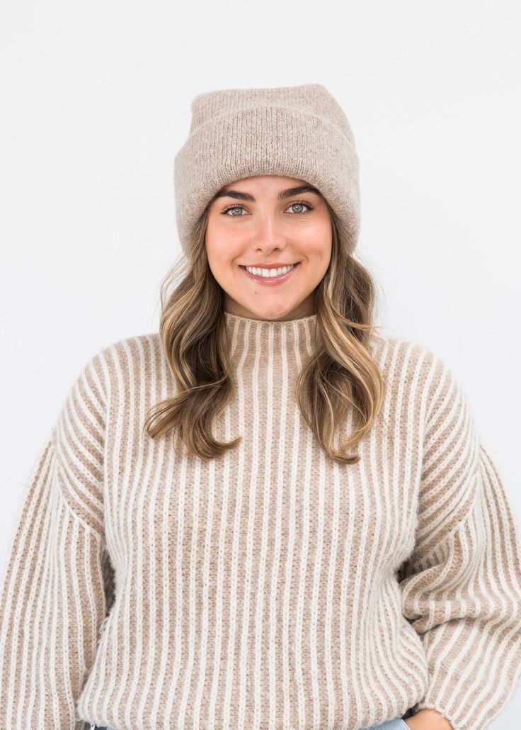 Stay warm and cozy with this Parker Oversized Beanie. Crafted with soft and luxurious handloomed wool-alpaca blend, this oversized style provides cozy comfort on chillier days. Elevated streetwear for your winter wardrobe! Crafted in partnership with producers in Peru with fair trade and sustainability as one of its core points. One Size 60% Alpaca | 30% Wool | 10% Polyamide Close knit + Felted Oversized Beanie, Elevated Streetwear, Oversized Style, Hand Loom, Comforters Cozy, Winter Wardrobe, Fair Trade, Warm And Cozy, Stay Warm