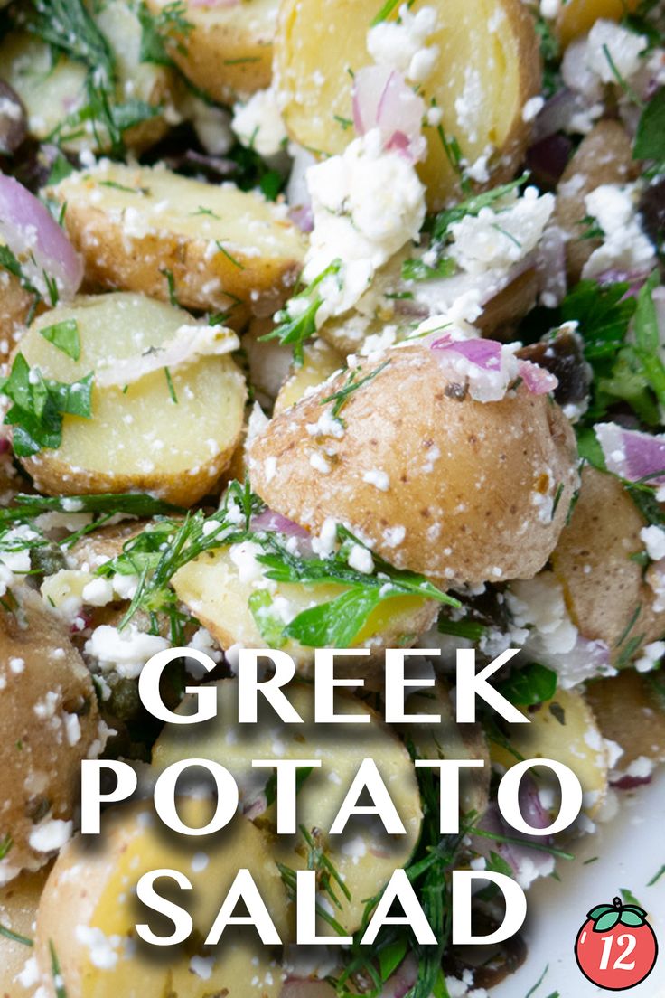 greek potato salad with feta cheese and fresh herbs on top, in a white bowl