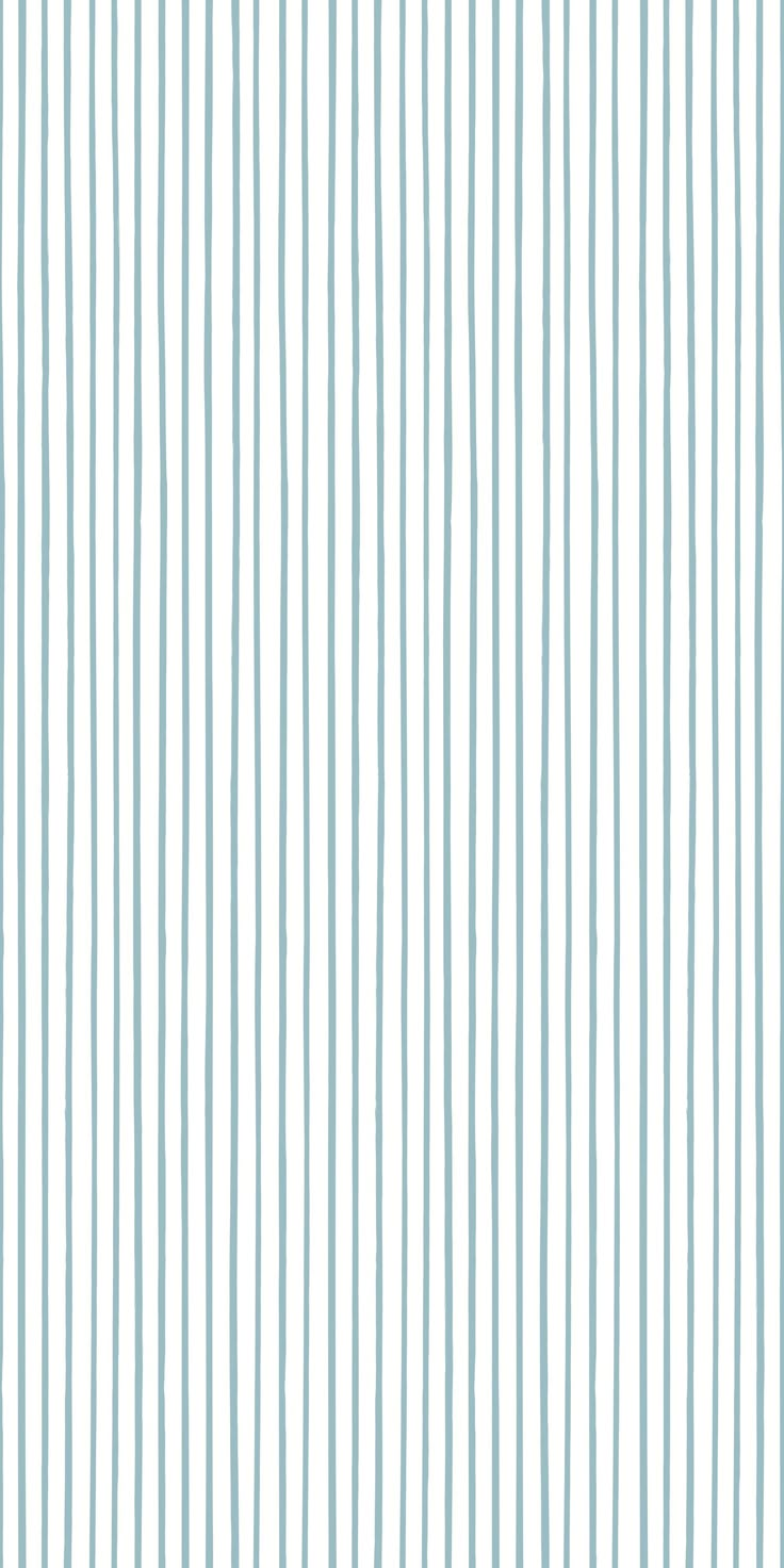 a white and blue striped wallpaper with vertical lines