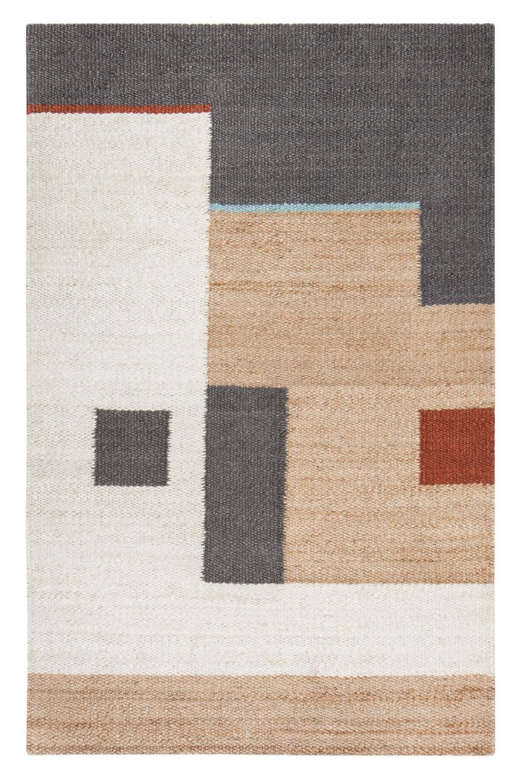 an area rug with different colors and shapes