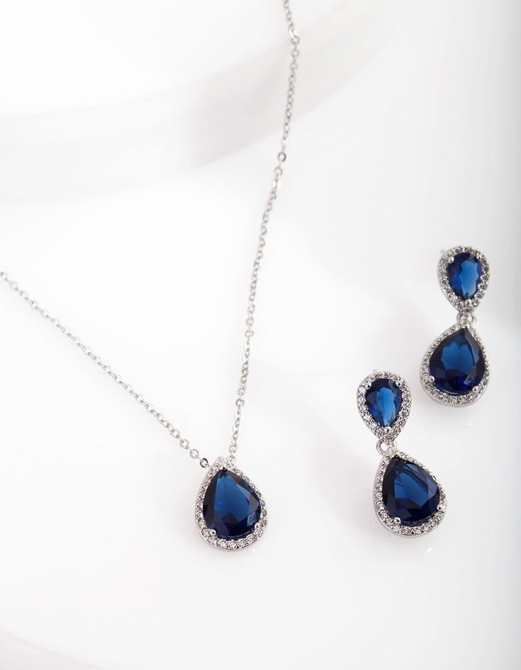 Description This jewellery set comes with a necklace and earrings. Both feature diamond simulants, which are cut to resemble the colour and clarity of true diamonds. At their centre is a teardrop-cut, sapphire-blue diamante. Wear this set to create a glam evening look. Length: 42cm Drop: 2.5cm | Lovisa Sapphire Teardrop Earrings Necklace Set Earrings Necklace Set, Diamond Simulant, A Necklace, Jewellery Set, Sapphire Blue, Favorite Rings, Necklace And Earrings, The Colour, Teardrop Earrings