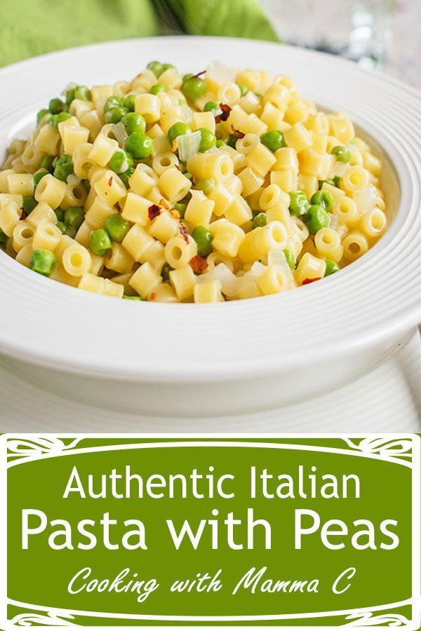 pasta with peas in a white bowl on a table