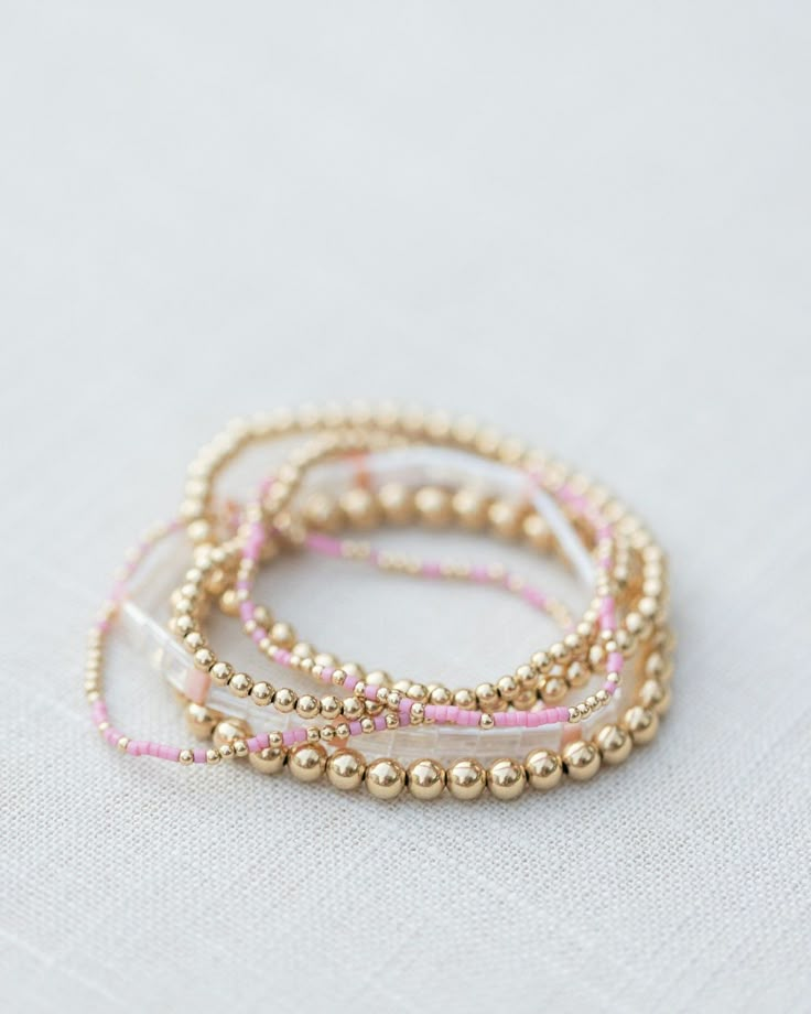 - 2mm gold filled ball beads mixed with color glass seed beads - 6.5 inches Gold And Pink Bracelet Stack, Gold And Pink Bracelet, Pink And Gold Bracelet, Trendy Bracelets 2024, Bracelet Ideas Seed Beads, Gold And Pink Jewelry, Preppy Bracelets, Bracelet Stacks, Preppy Jewelry