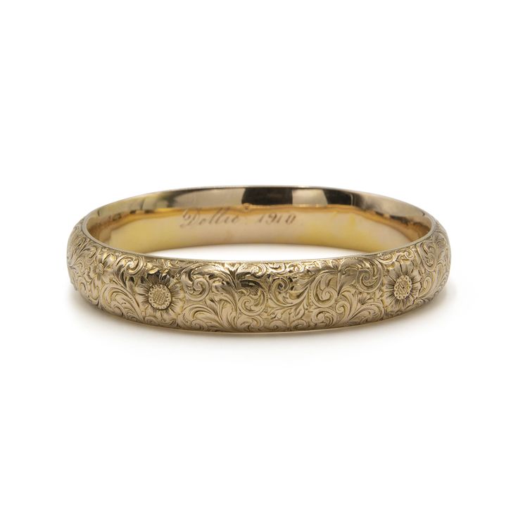 Stylized floral and scroll motifs adorn an engraved 14 karat yellow gold bangle with a personal engraving "Dollie 1910". Bangle With Diamonds, Princess Stuff, Fred Leighton, Engraved Bangle, Bangles Gold, Yellow Gold Bangle, Gold Bangle, Gold Floral, Gold Bangles