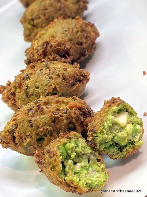 broccoli and cheese balls on a white plate