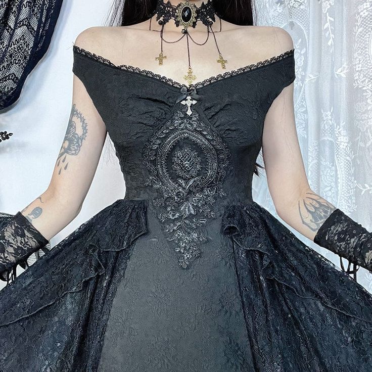 Step into the shadows of style with our Women's Gothic Off-the-Shoulder Lace Splice Halloween Dress, meticulously designed to captivate and enchant. This dress is a masterpiece of intricate details and haunting beauty, perfect for those who dare to stand out. 
 
The patchwork design on the waist features ruffled lace that adds depth and texture to the dress. Each lace splice is carefully placed to enhance the silhouette and create a sense of mysterious allure. 
 
The off-the-shoulder design acce Black Vampire Corset Dress For Halloween, Halloween Fancy Dress With Overbust Shape, Gothic Off-shoulder Fitted Dress, Gothic Victorian Dress For Halloween, Witchy Black Corset Dress For Party, Black Witchy Corset Dress For Party, Gothic Dresses For Halloween Cosplay, Witchy Victorian Dress For Halloween Costume, Witchy Victorian Dress For Halloween