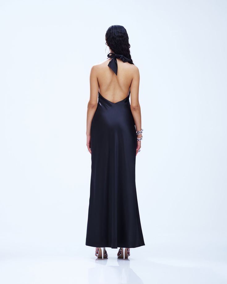 Slip into seduction with this black maxi dress 🖤 Made from luxurious satin charmeuse fabric, this piece is complete with a bias cut and a cowl neck for a look that gives off a chic and mysterious vibe that will have everyone hooked 😌 Satin Midi Dress With Bias Cut For Night Out, Fitted Maxi Dress With Satin Finish For Evening, Elegant Satin Slip Dress For Evening, Elegant Satin Slip Evening Dress, Chic Satin Finish Backless Maxi Dress, Evening Satin Finish Maxi Dress, Satin Finish Maxi Dress For Evening, Elegant Maxi Dress With Satin Finish For Night Out, Elegant Satin Finish Maxi Dress For Night Out