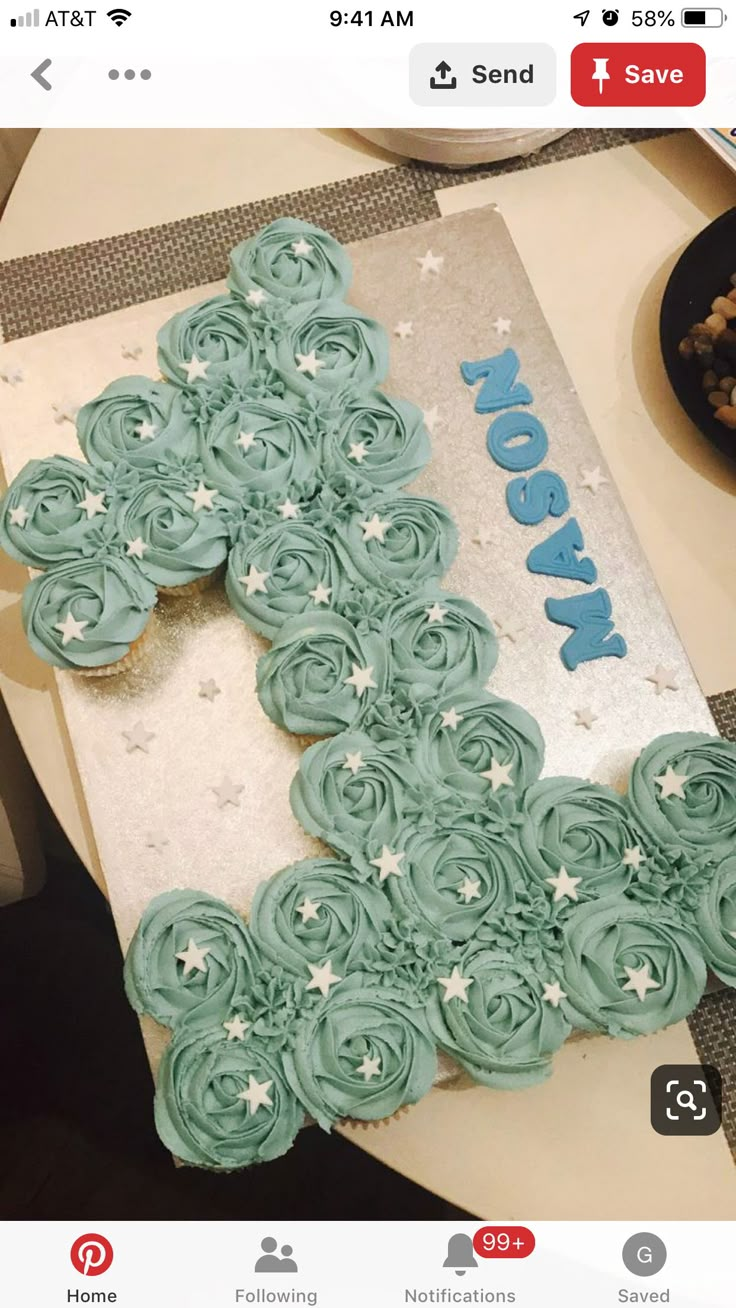 a birthday cake with frosting and stars on it