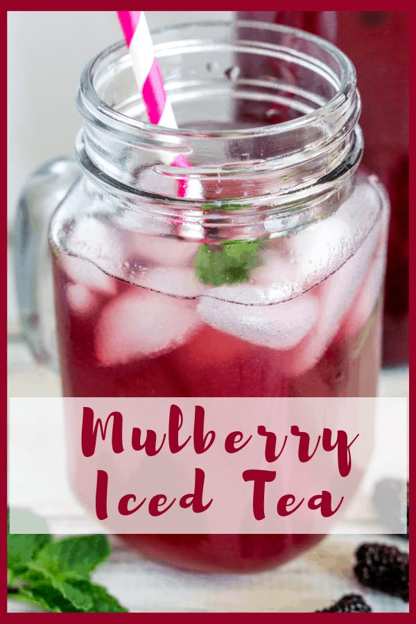 a mason jar filled with mulberry iced tea