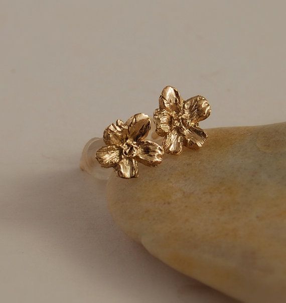 Detailed little 5 pedal blossom in a 14K gold post earrings. 1/4 across Yellow gold in stock now.  A great stud earring for someone who just likes Delicate Gold Earrings With 3d Flowers, Gold Flower Cluster Earrings For Pierced Ears, Rose Gold Flower Earrings In 14k Gold, Dainty Gold Jewelry With 3d Flowers, 14k Rose Gold Flower Earrings, Gold Flower Cluster Earrings Gift, Delicate Tiny Gold Flower Earrings, Gold Jewelry With 3d Flowers For Jewelry Making, 14k Gold Flower Earrings For Gift