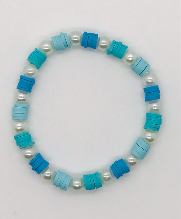 Blue Preppy Bracelet Ideas, Beachy Clay Bracelets, Light Blue Clay Bead Bracelet, Clay Bead Bracelet Ideas Ocean, Blue And White Clay Bead Bracelets, Clay Bead Design Ideas, Heshi Bead Ideas, Clay Bead Ideas Bracelet, Clay Bead Bracelet Ideas Summer Preppy