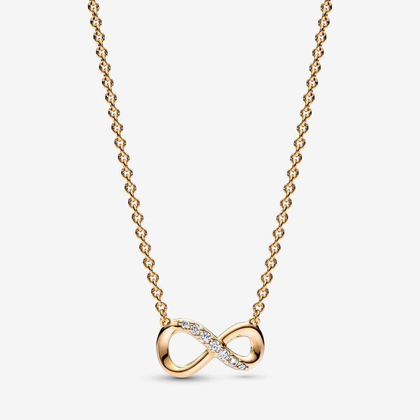 Celebrate your love to infinity and beyond with the Sparkling Infinity Collier necklace. Featuring a fixed infinity symbol pendant, this 14k gold-plated piece symbolises the power of unbreakable bonds and serves as a reminder of the love you share with those that matter most to you. The symbol features stones along the top line of the motif as well as a sliding clasp, so you can adjust your collier necklace's length. Wear it as a way of showing your appreciation for a loved one or gift it to som Birthday Needs, Dream Heels, B Day Gifts, Turning 21, Relationship Goals Text, Pandora Gold, Pandora Necklace, Infinity Jewelry, Bracelet Pandora