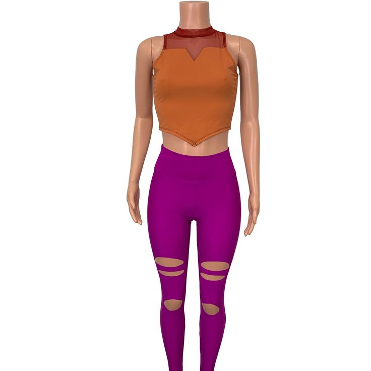 Our Catra costume includes fuchsia spandex high-waisted stirrup leggings with slits on the legs and rust-colored spandex crop tank with red mesh detail in a perfect set for your costume party. The high waist leggings have a 30" inseam. You can request a custom inseam in the customization box. Stretch Crop Top For Cosplay, Stirrup Leggings, Stirrups, She Ra, Rust Color, Crop Tank, High Waisted Leggings, Costume Party, Spandex