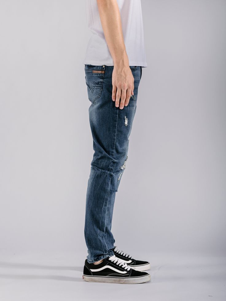 Effortlessly elevate your style with our Ripped Skinny Jeans. These simple and neat design jeans not only provide comfort, but also make for a stylish addition to any outfit. Easy to match, these jeans are a must-have for any fashion-forward individual. Achieve a sleek and flattering look with our Skinny Jeans. Fabric: 70% COTTON, 28% POLYESTER, 2% SPANDEX Machine wash cold Imported G4DB903S Size Chart Size 28 29 30 31 32 Waist 29 - 30.5 30.5 - 31.5 31.5 - 33.5 32.5 - 33.5 33.5 - 34.5 Size 33 34 Urban Dark Wash Mid-rise Pants, Distressed Stretch Bottoms For Everyday, Everyday Stretch Distressed Bottoms, Stretch Distressed Bottoms For Everyday, Modern High Rise Jeans For Streetwear, Modern High-rise Jeans For Streetwear, Edgy Mid-rise Bottoms For Everyday, Modern Medium Wash Bottoms For Streetwear, Modern Streetwear Bottoms In Medium Wash