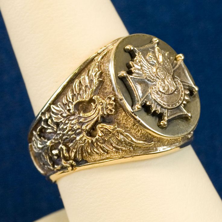 The design of this ring has been created for Catholic Bishops in Poland. Only selected were awarded with permission to wear it. Ring represents the Historic Polish White Eagle engraved on either side of the ring. The top design is an image of Our Lady of Czestochowa (Matka Boska Czestochowska) in front of Independence Eagle on top of the Scouts Badge. 14K Yellow Gold Ring face measures 0.562" x 0.687" Made in Poland Packaged in gift jewelry box. Gold prices fluctuate often. What you see online i Symbolic Hallmarked Signet Ring For Formal Occasions, Symbolic Formal Signet Ring Hallmarked, Formal Symbolic Hallmarked Signet Ring, Oval White Gold Engraved Collectible Ring, Heirloom Ceremonial Jewelry With Polished Finish, Ceremonial Sterling Silver Hallmarked Rings, Symbolic Formal Signet Ring With Polished Finish, Ceremonial Sterling Silver Rings With Polished Finish, Collectible Yellow Gold Rings With Polished Finish