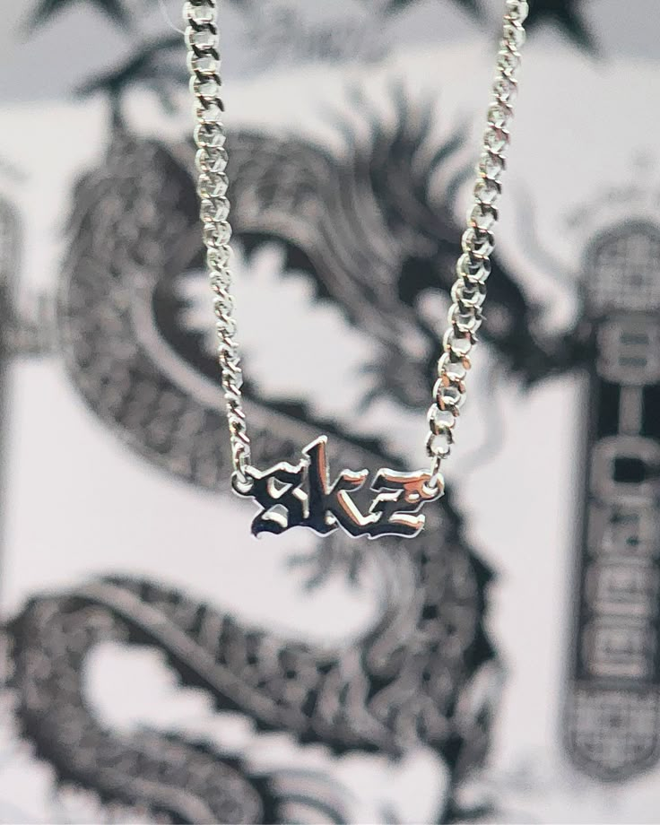 This subtle SKZ necklace is perfect for any STAY who wants to show their love for Stray Kids daily! Featuring the nameplate and cuban chain with an extension. This piece will be perfect to pair with your existing collection.  *Details* - Made from Hypoallergenic Stainless Steel - 2.2mm Cuban Chain - 40cm/15inch chain length plus 5cm/2inch extension Seungmin Heart Ring H&m, Necklace For Sibling, Maxident Skz Shoes, Xo The Weeknd Necklace, Skz Beads Necklace, Lee Felix Jewelry, Clasp Ring Skz, Maxident Jewelry, Hyunlix Matching Rings